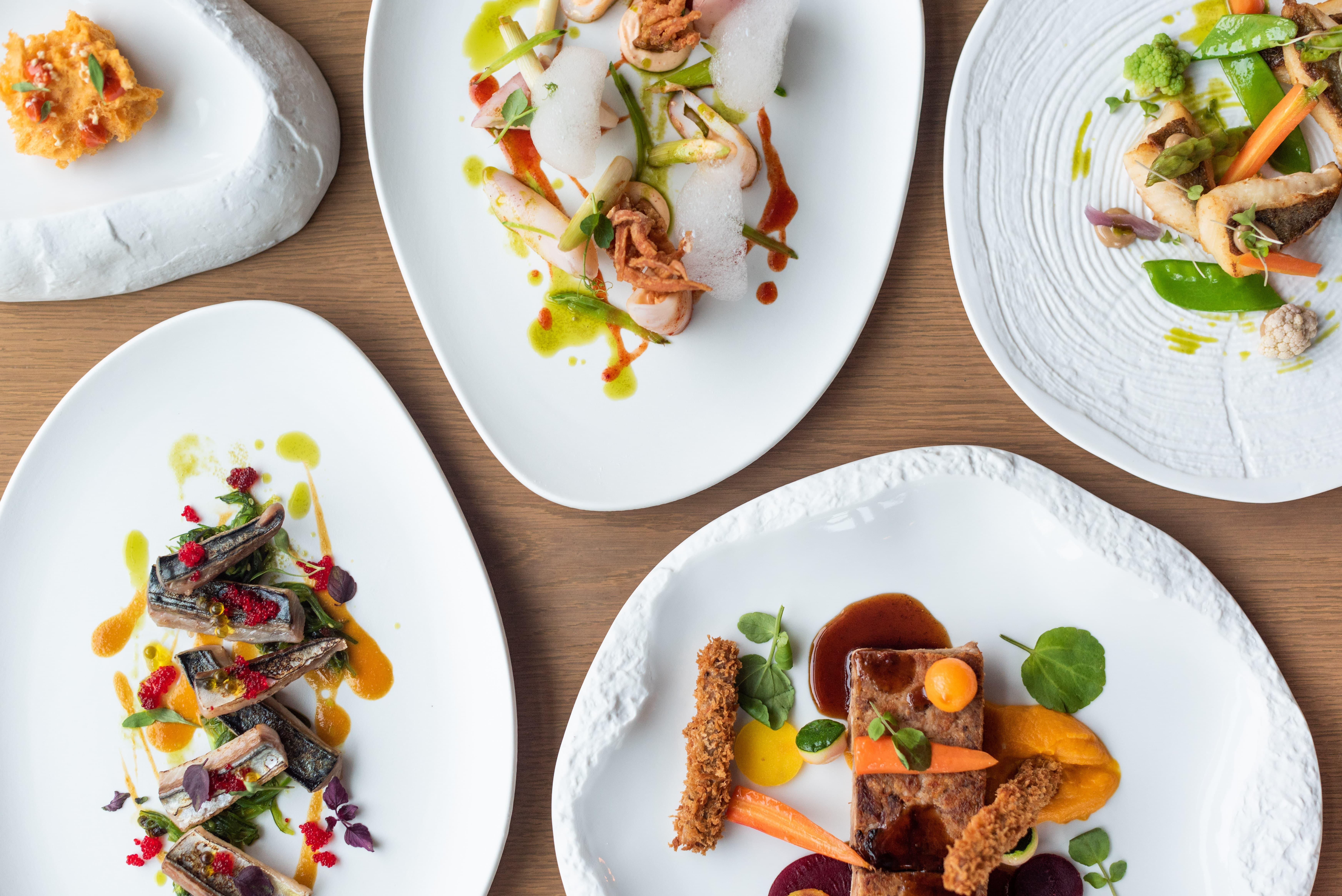Aguas De Ibiza Grand Luxe Hotel - Small Luxury Hotel Of The World Santa Eularia des Riu Ngoại thất bức ảnh Dishes at the restaurant