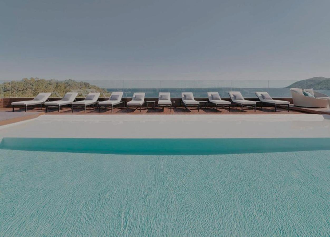 Aguas De Ibiza Grand Luxe Hotel - Small Luxury Hotel Of The World Santa Eularia des Riu Ngoại thất bức ảnh The pool at the hotel