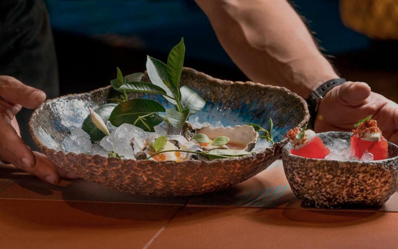 Aguas De Ibiza Grand Luxe Hotel - Small Luxury Hotel Of The World Santa Eularia des Riu Ngoại thất bức ảnh A dish of abalones