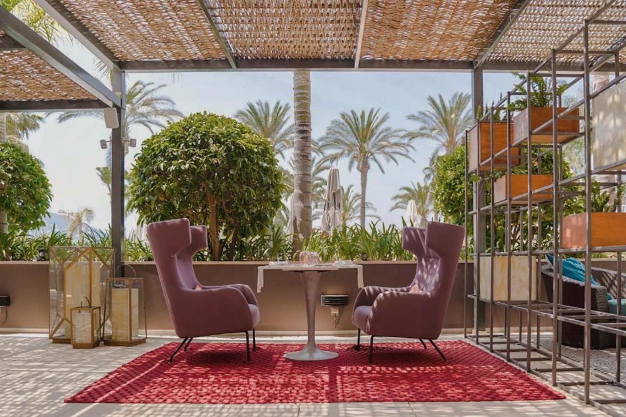 Aguas De Ibiza Grand Luxe Hotel - Small Luxury Hotel Of The World Santa Eularia des Riu Ngoại thất bức ảnh The rooftop terrace at the hotel