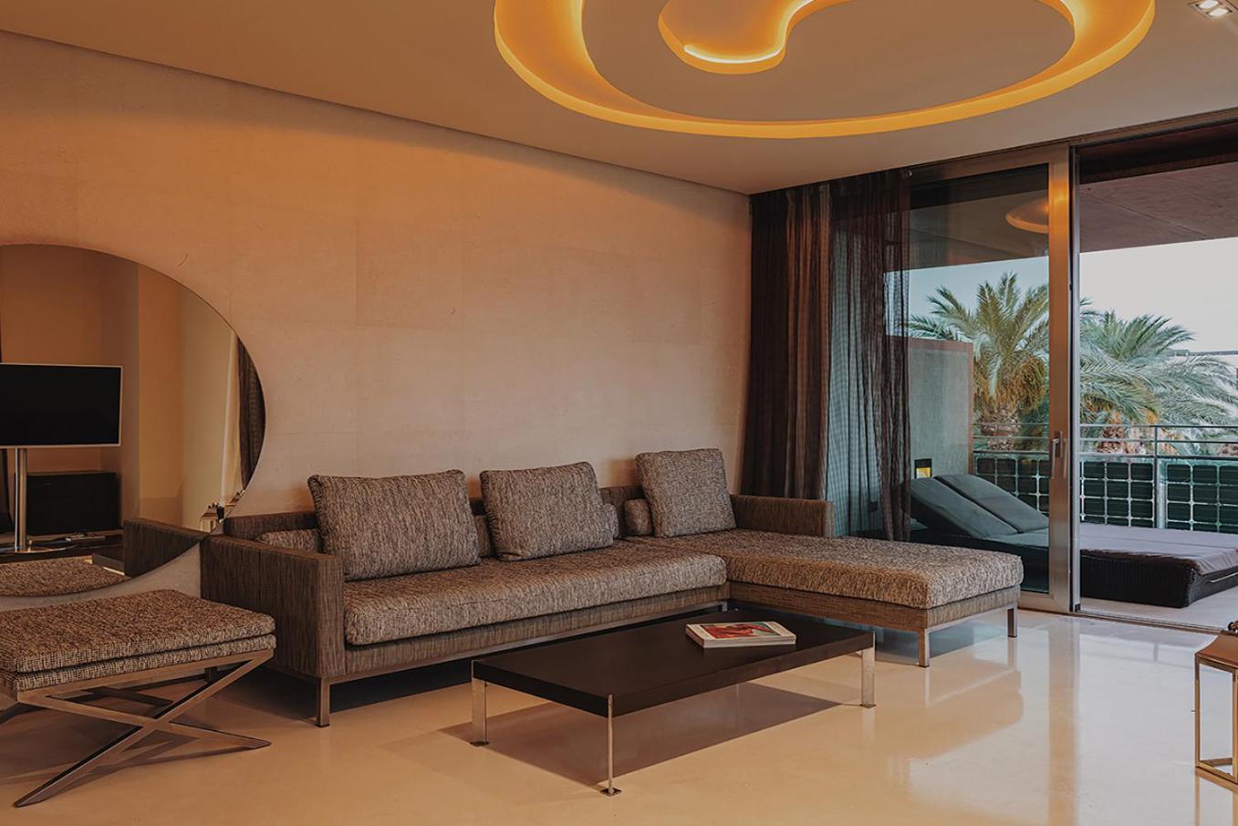 Aguas De Ibiza Grand Luxe Hotel - Small Luxury Hotel Of The World Santa Eularia des Riu Phòng bức ảnh A living room in a luxury apartment