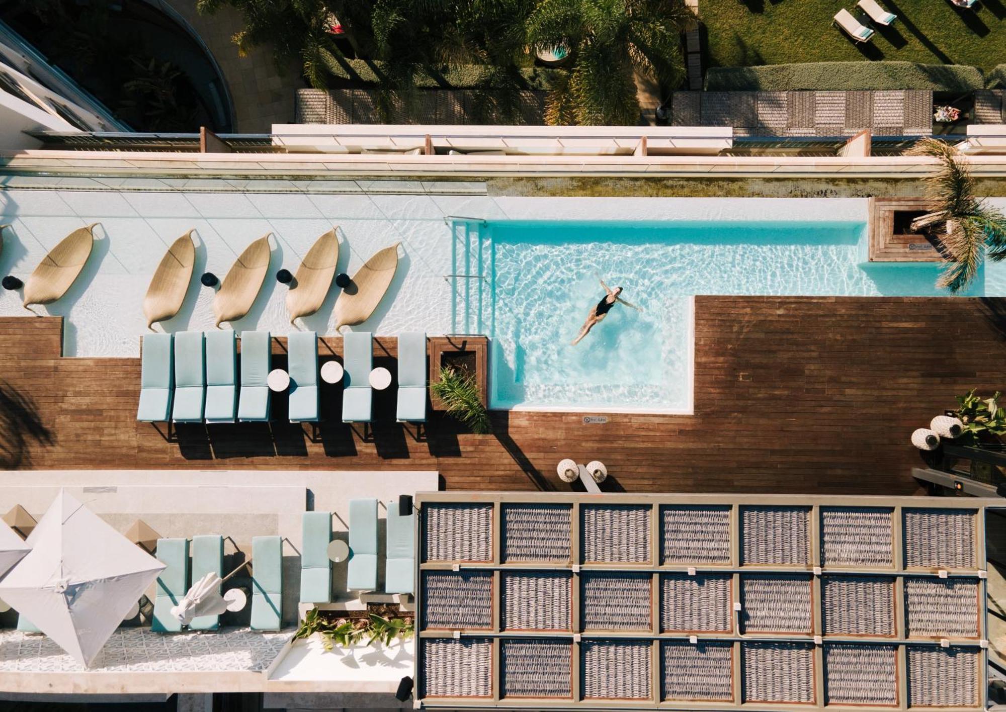 Aguas De Ibiza Grand Luxe Hotel - Small Luxury Hotel Of The World Santa Eularia des Riu Ngoại thất bức ảnh The rooftop pool at the hotel